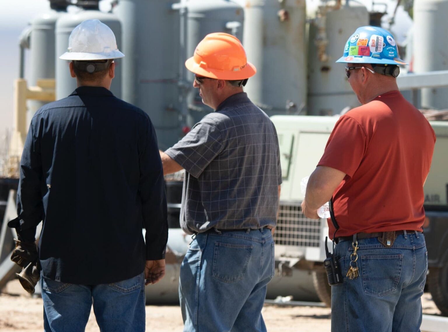 Construction workers at industrial site